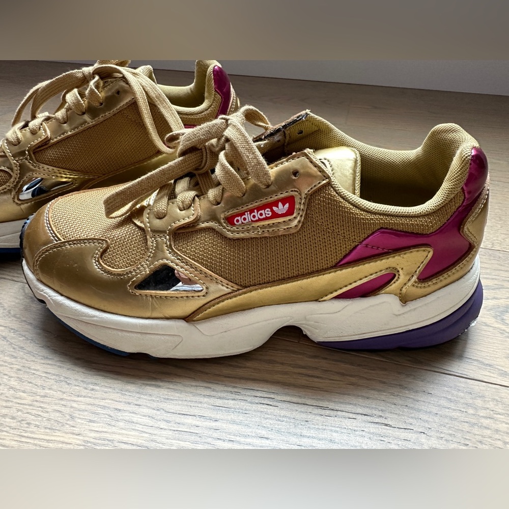 Woman’s Adidas - gold and purple sneakers